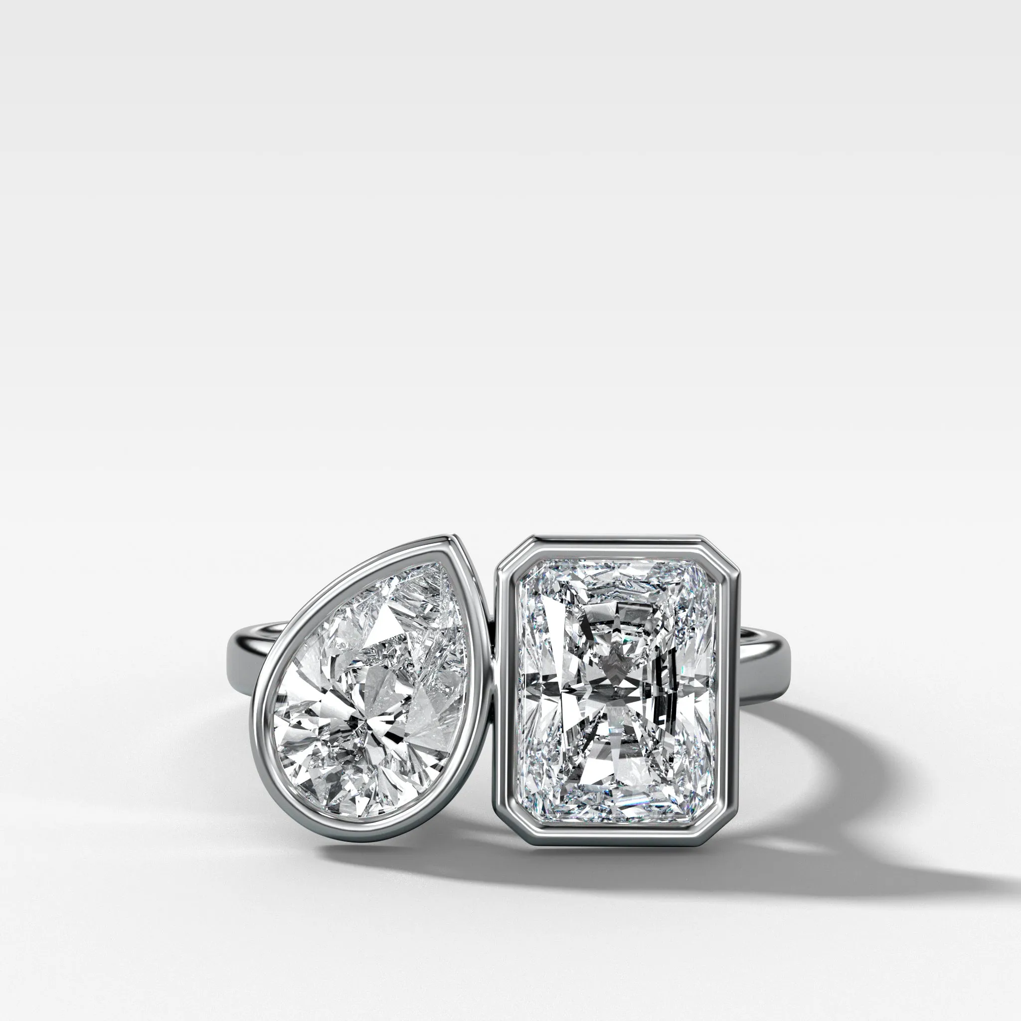 Toi et Moi Bezel Engagement Ring with Pear and Radiant Cut Diamonds